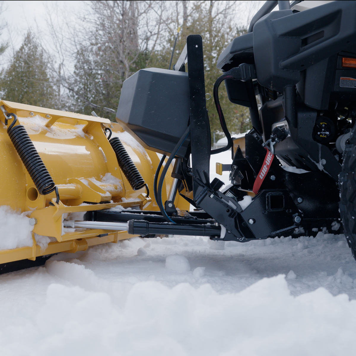 Système hydraulique robuste avec attache rapide Can-Am Defender